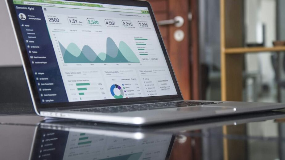 Laptop showing website traffic statistics, illustrating SEO costs and results for Canadian businesses