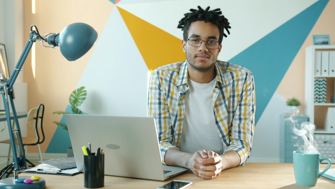 Business owner at his desk planning Google Ads and SEO