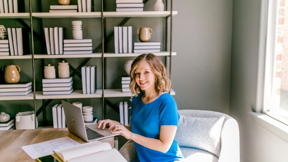 Small business owner updating her Google Business Profile on a laptop