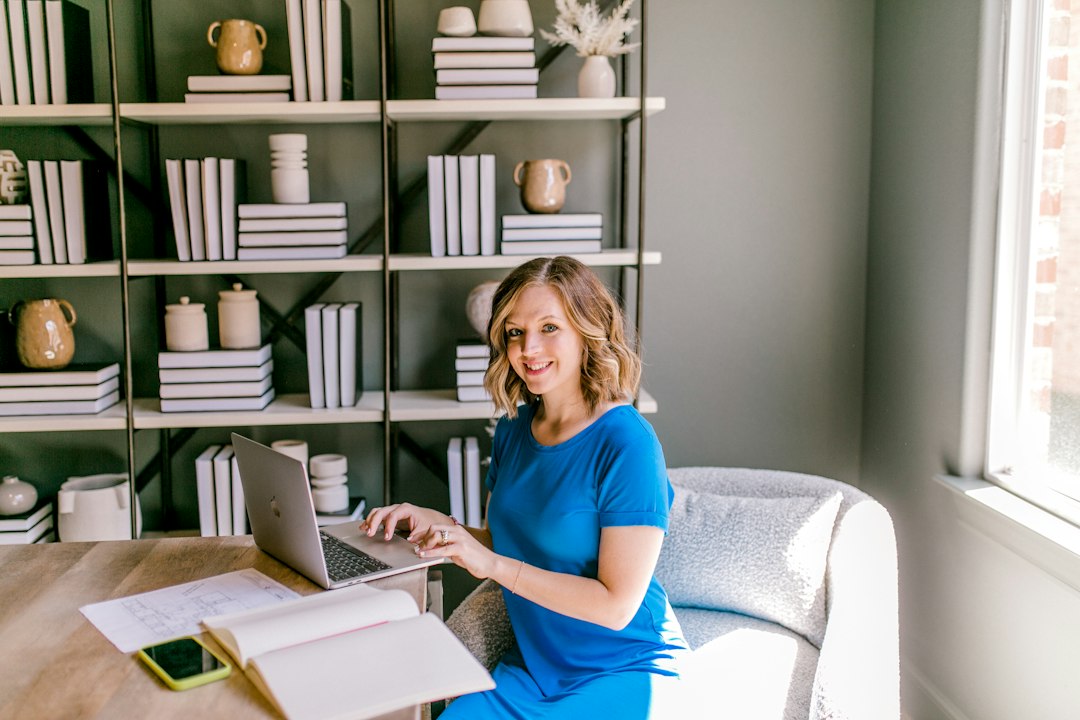 Small business owner updating her Google Business Profile on a laptop